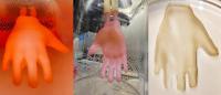 3 images of hand-shaped engineered skin in production